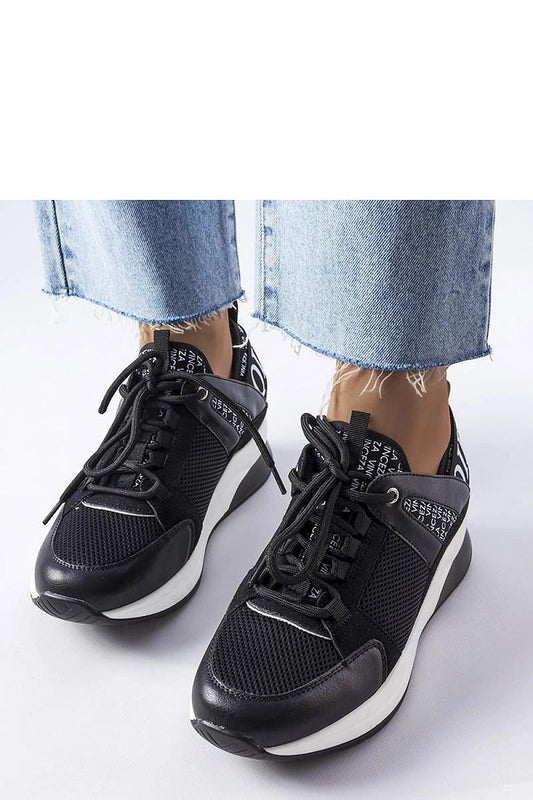 Close-up view of Solea vegan leather sneakers showing the elegant round toe and durable thick soles, ideal for comfort and luxury wear.