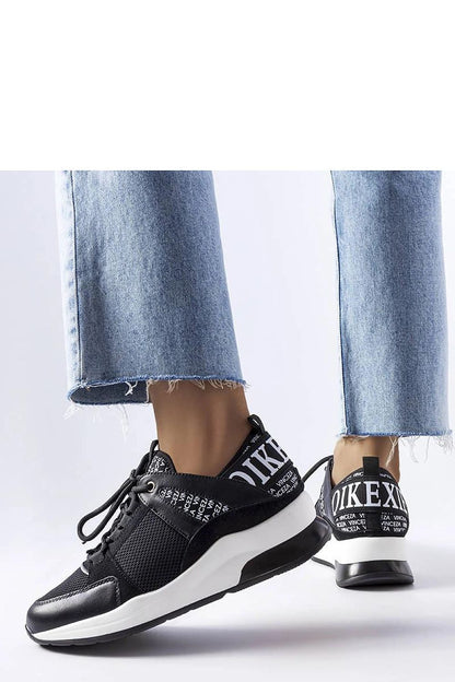 Solea vegan leather sneakers in black and white, showcasing a minimalist platform design, perfect for luxury summer outfits.