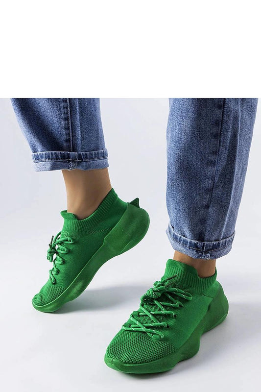 Luxury Côté green sneakers made of breathable fabric, designed for summer comfort.