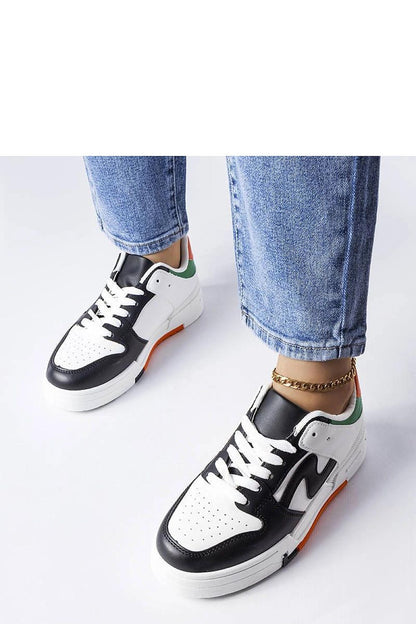 Elegant Solea black and white sneakers featuring a stylish lace-up closure and thick sole, perfect for casual summer wear.