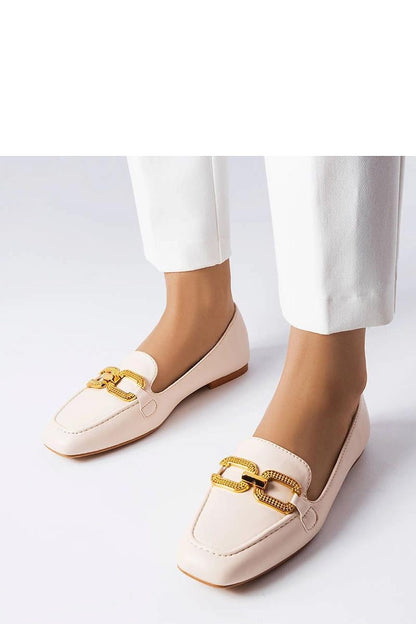 Close-up of the stylish buckle detail on Solea's black eco leather moccasins, perfect for summer.