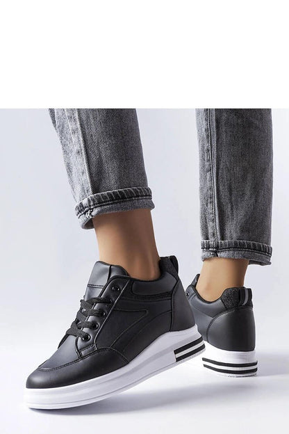 Chic black sneakers adorned with sequins from Solea, combining comfort and elegance for both casual and special occasions.