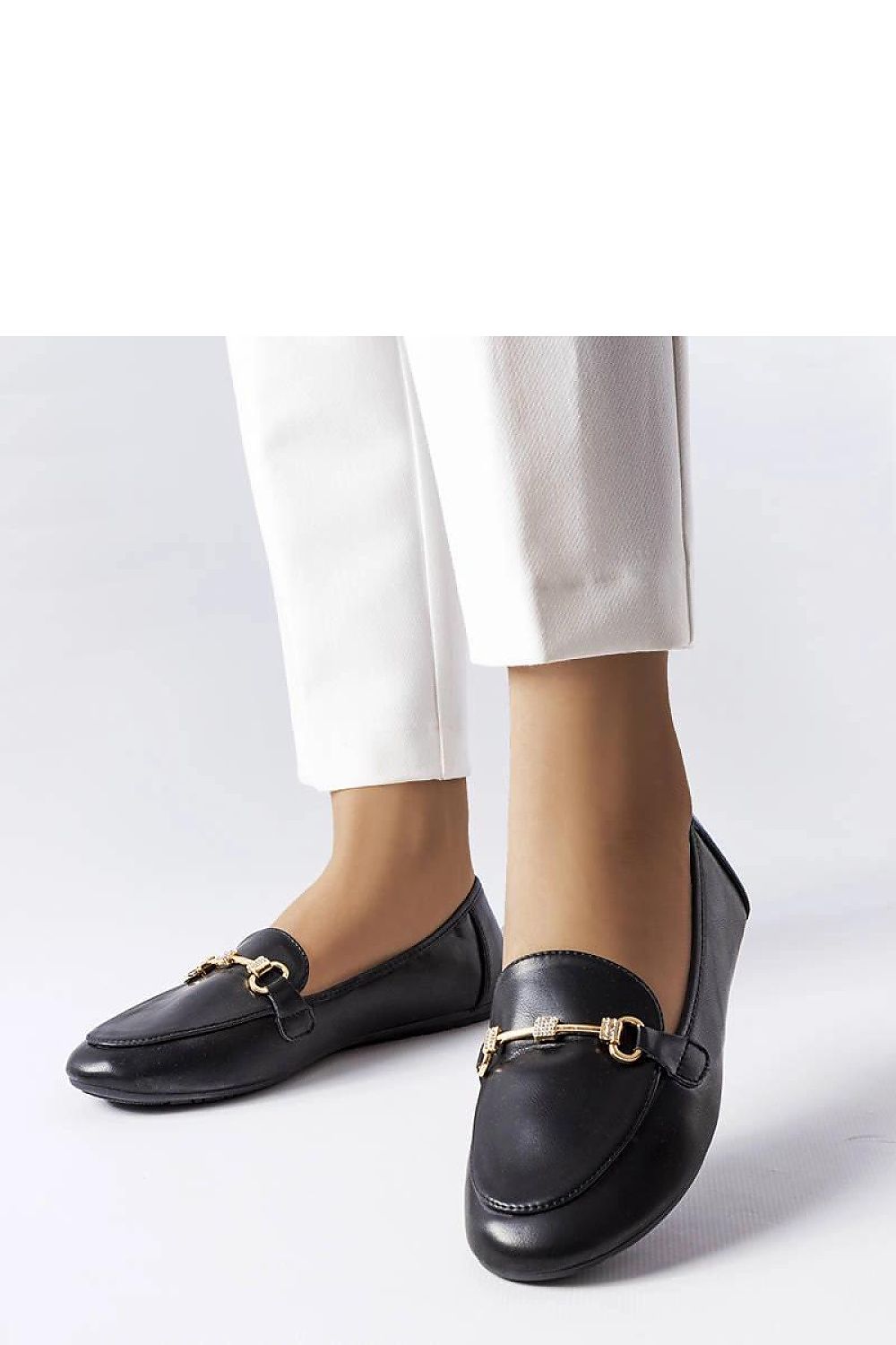 Stylish brown moccasins by Solea with a comfortable flat sole, perfect for summer outings, seamlessly blending elegance with practicality.