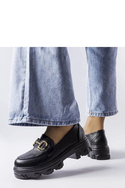 Close-up of Solea eco leather black Mason buckle shoes for women, showcasing the sleek design and sturdy buckle closure, perfect for versatile fashion.