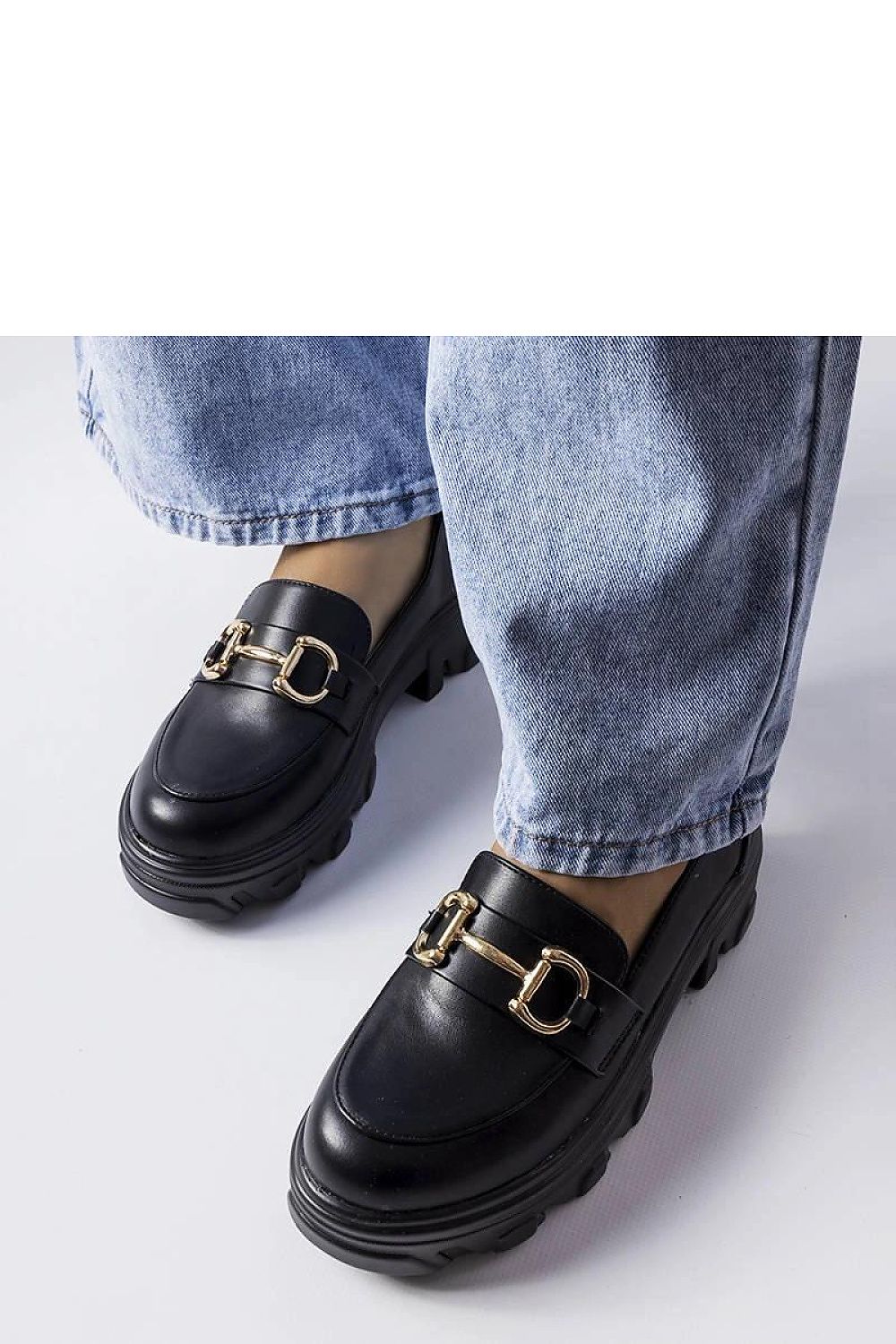 Elegant black Mason buckle shoes for women made of eco leather by Solea, featuring a minimalist design and a comfortable rubber sole, perfect for fashionable summer wear.