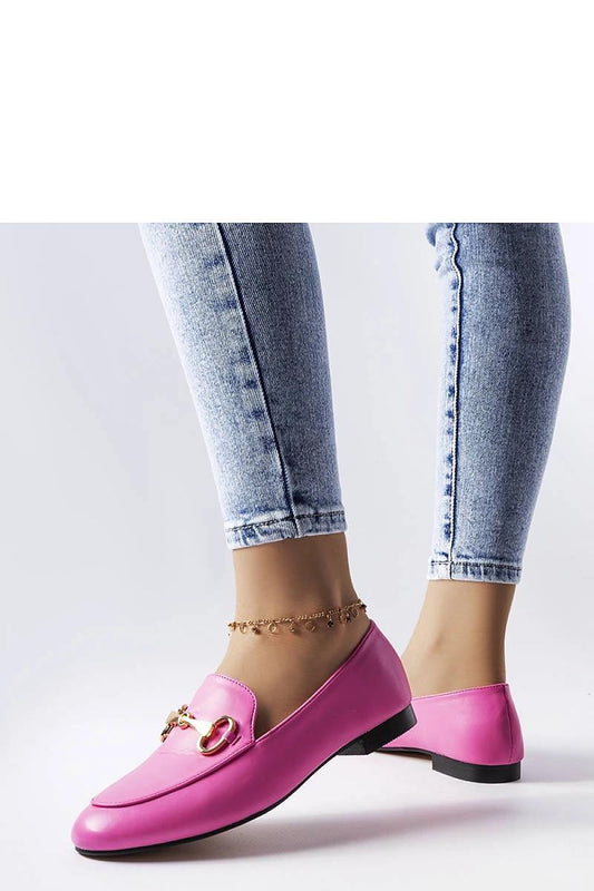 Close-up view of Solea's luxury pink moccasins, featuring delicate stitching and a chic buckle, perfect for summer fashion.