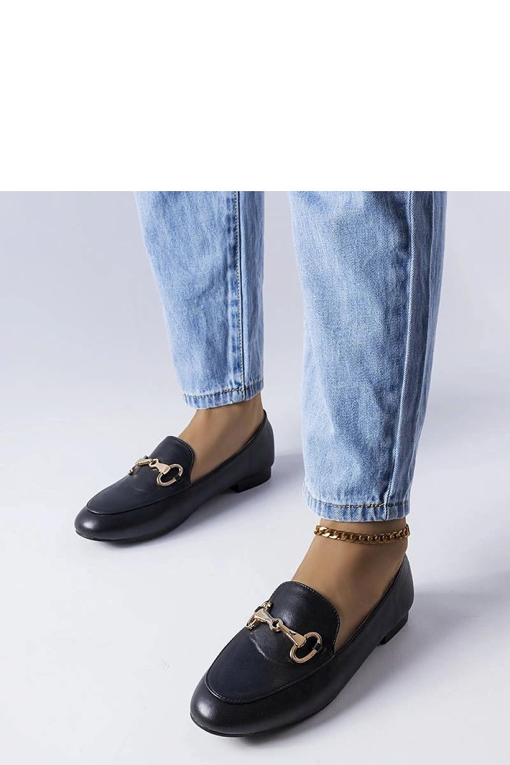 Stylish display of luxury pink moccasins by Solea on a soft surface, highlighting the elegant synthetic leather and comfort-fit design.