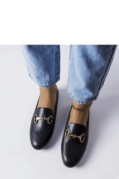 Elegant Solea pink moccasins showcasing a flat sole and rounded toe design, perfect summer footwear for a stylish look, featuring a slip-on closure.