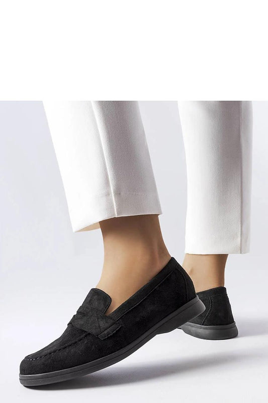 Close-up view of Solea's luxury eco-suede black moccasins, highlighting high-quality craftsmanship and sleek silhouette for women's elegant footwear.