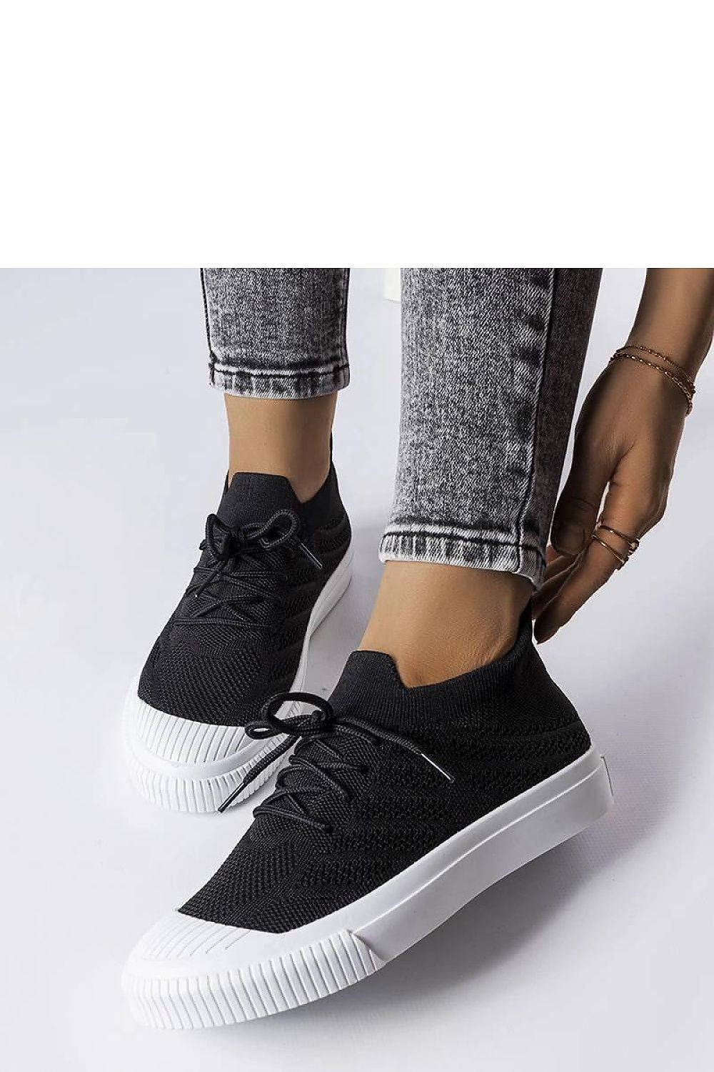 Solea Flexible Polaire Sneakers in Black - Stylish ankle-high sneakers with a soft textile insole and rubber toe insert for durability, ideal for comfort and style.