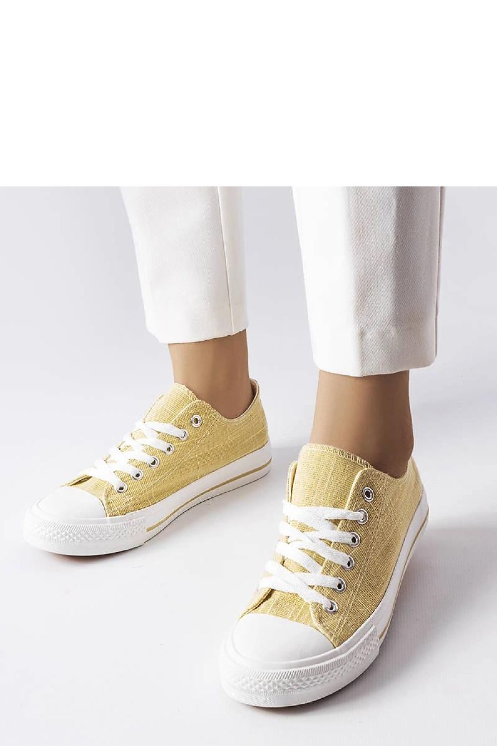 Close-up of Solea Golden Shiny Sneakers Vignette showcasing the rounded rubber toe and stylish flat laces, ideal for fashion-forward individuals.