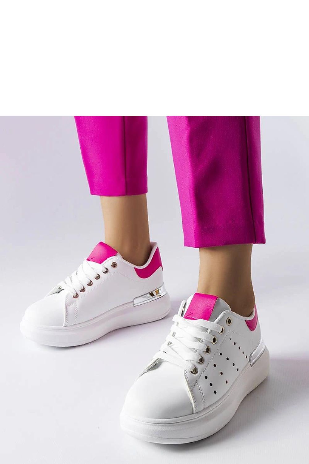 Elegant Solea Chalut Sneakers in pristine white leather, featuring delicate perforation for breathability and luxury comfort.