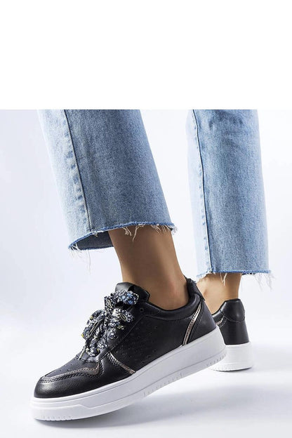 Sleek white Pryor sneakers with ribbon lace accents, created by Solea, combining comfort and style for summer wear.