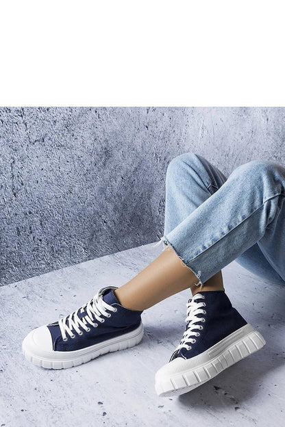Elegant navy blue ankle sneakers from Solea, designed for comfort and stability with a chic lace-up design, ideal for everyday fashion.