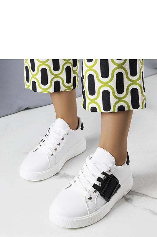 Luxury white sneakers by Solea featuring a stylish black buckle and lace-up comfort for a perfect fit, ideal for summer fashion.