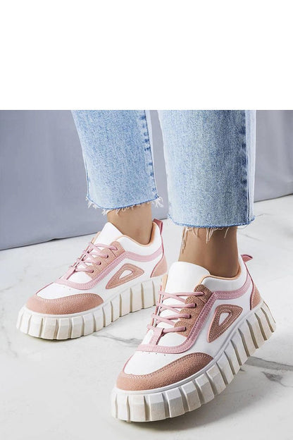Elegant close-up of Solea's pink platform sneakers Robyn showcasing their wide grooving detail and lace-up closure for a chic look.