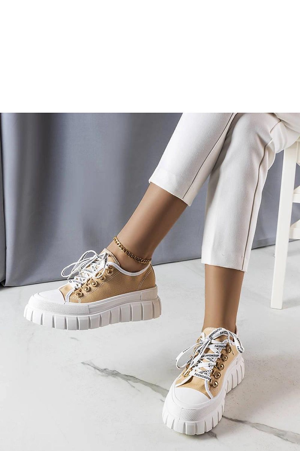 Solea Toni Pink Platform Sneakers styled with oversized sweater and trendy jeans, ideal for a chic streetwear ensemble.