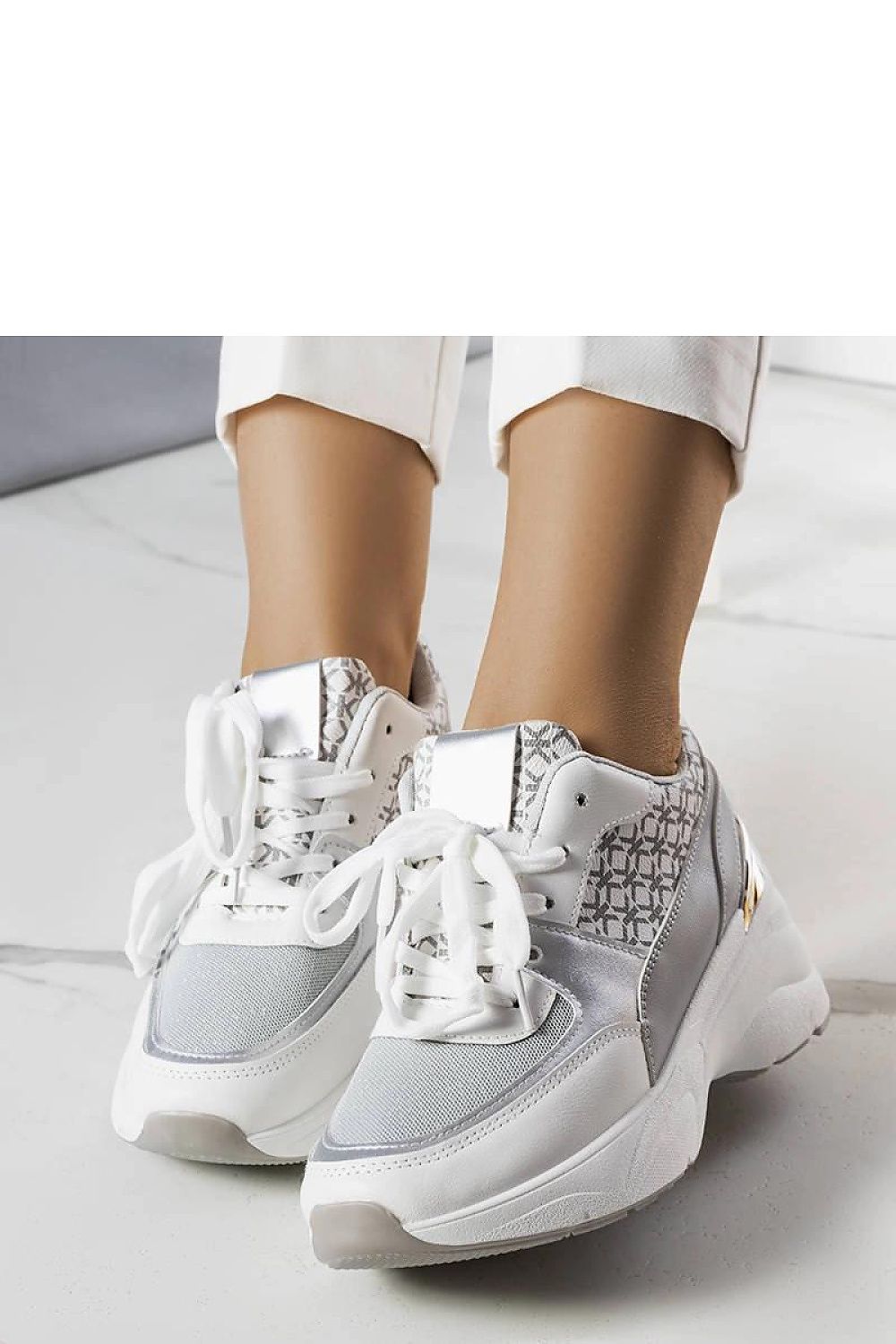 Solea Grey Sneakers featuring Lora Hurtado's exclusive monogram design, epitomising luxurious summer comfort, ideal for stylish casual outings.