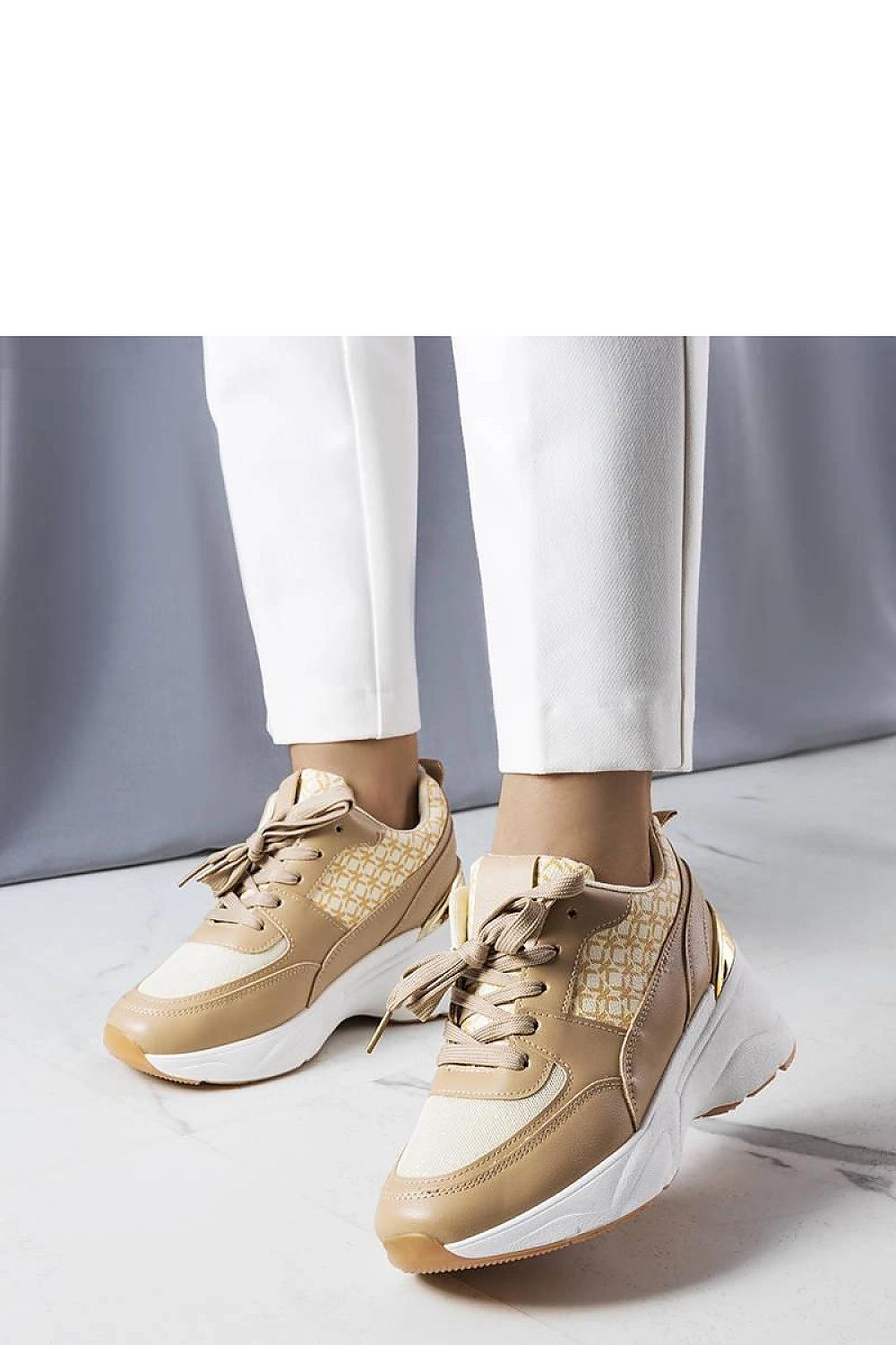 Solea Grey Sneakers styled with trendy outfits, perfect for adding sophistication to both everyday and special occasion looks.