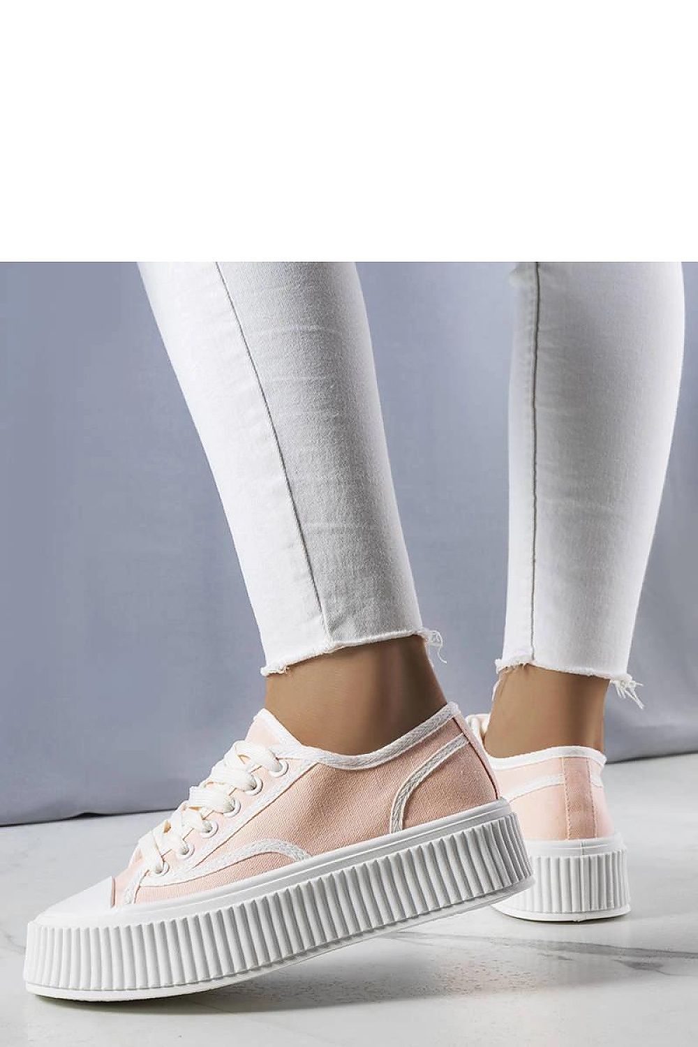 Luxury light pink platform sneakers Delores by Solea, featuring a stylish ankle-high design and thick rubber sole for enhanced comfort.