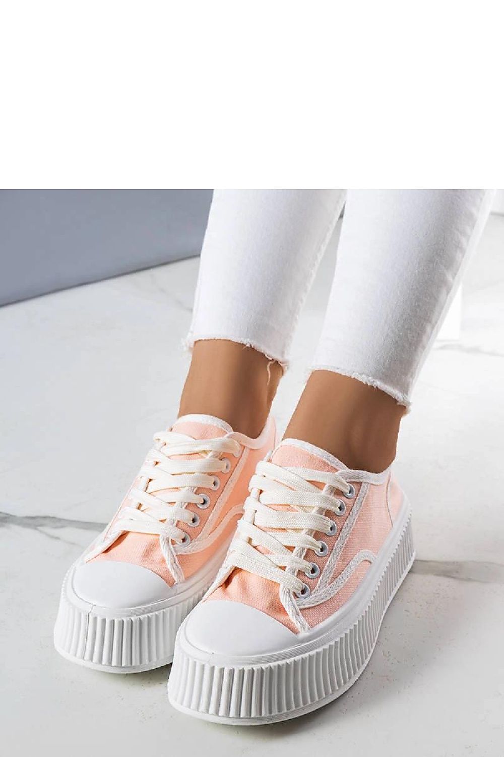 Close-up image of Solea Delores light pink platform sneakers showcasing the soft fabric and cushioned insole for ultimate comfort.
