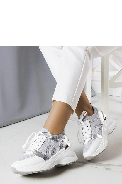 Close-up of Solea Women's Pink Wedge Sneakers, featuring delicate stitching and a 6 cm heel for a chic and comfortable look.