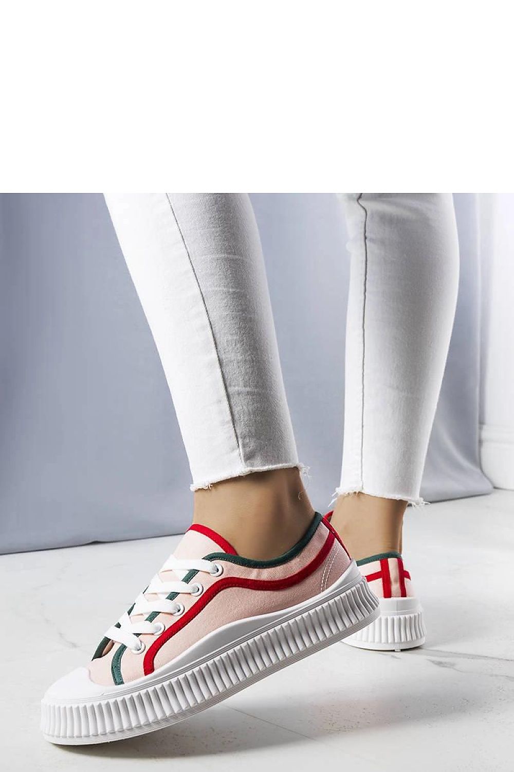 Lifestyle shot featuring Solea's Johanna pink platform sneakers paired with trendy outfits, ideal for summer styling, showcasing comfort and sophistication.