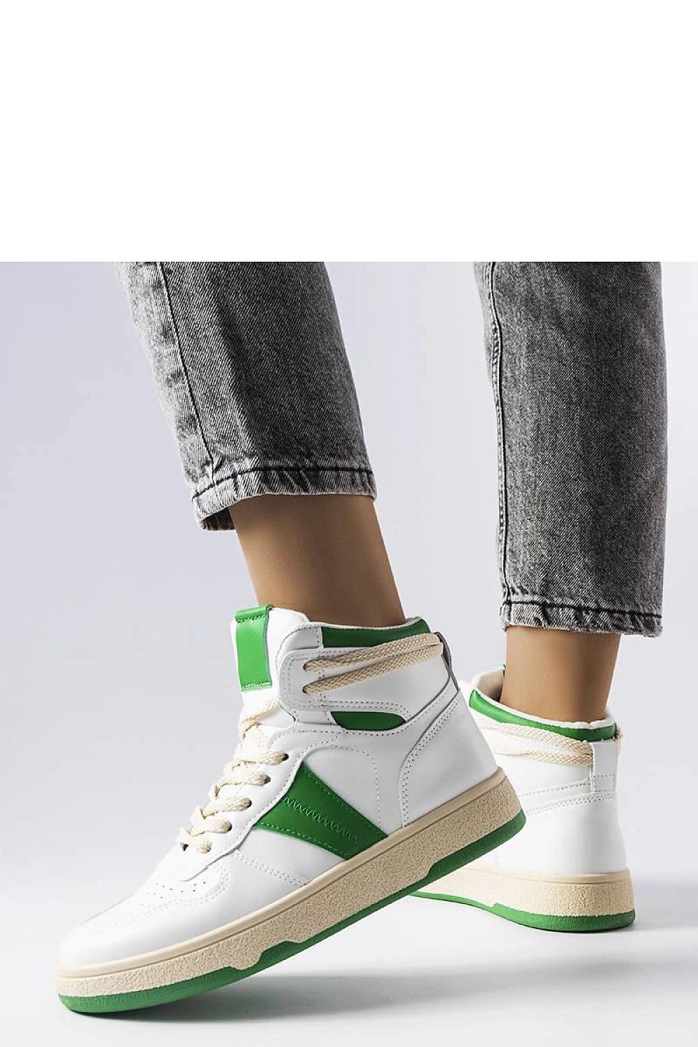 Solea blue high-top sneakers styled with casual attire, ideal for day-to-night summer occasions.