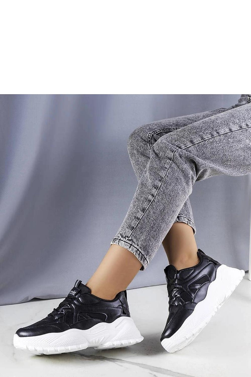 Solea stylish black sneakers featuring a 5 cm sole, perfect for summer casual wear, showcasing luxurious comfort and elegant design.