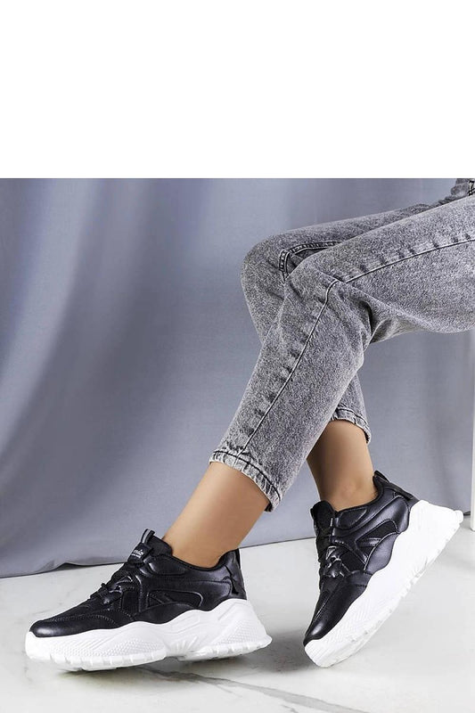 Solea stylish black sneakers featuring a 5 cm sole, perfect for summer casual wear, showcasing luxurious comfort and elegant design.