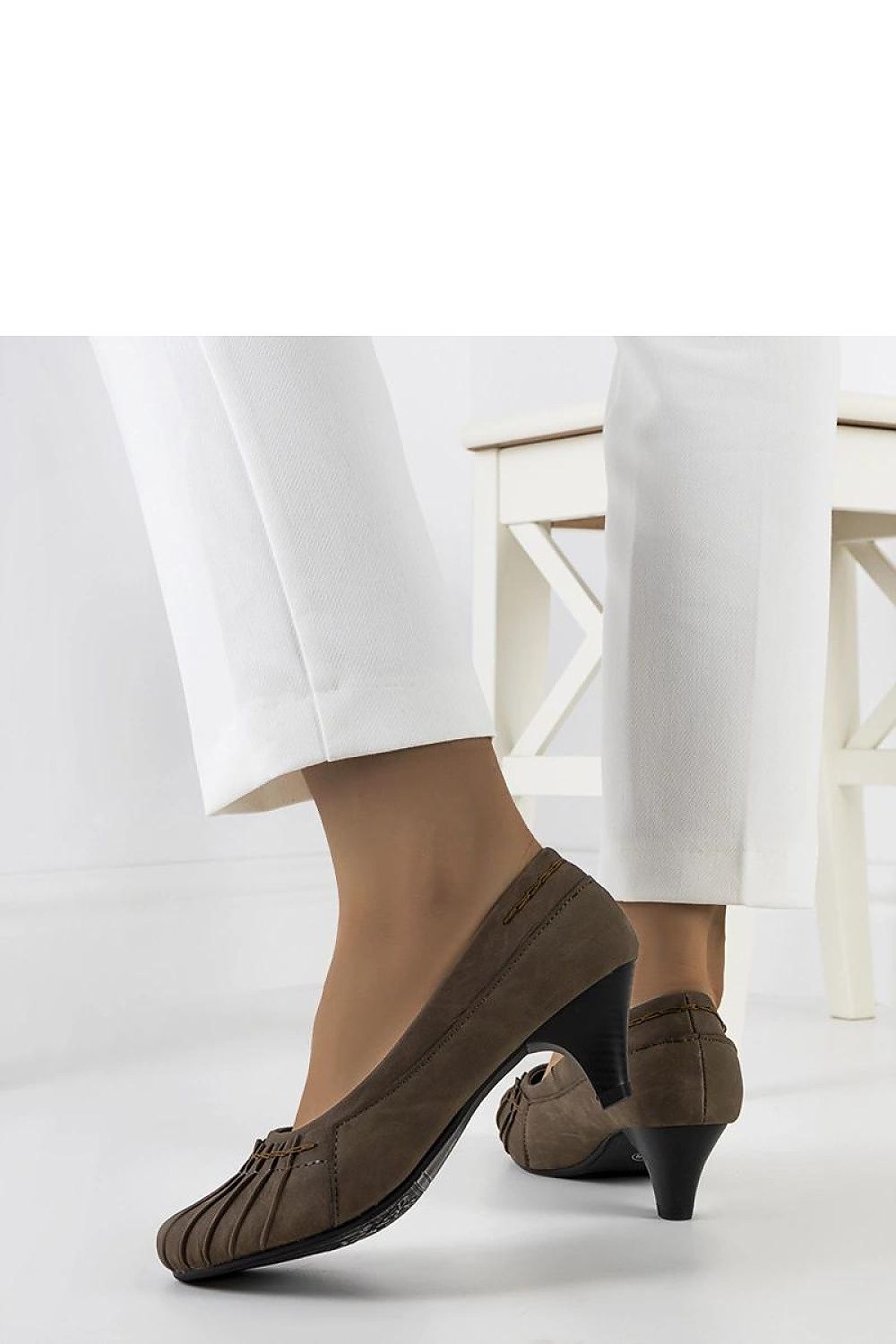 Close-up of the sophisticated ruching design on the eco leather brown pumps by Solea, exemplifying luxury and versatility for both office and formal events.