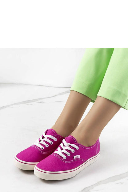 Chic Solea Pink Emall Sneakers displayed against a fashionable summer backdrop, highlighting comfort and stylish pink fabric for women.