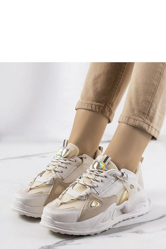 Close-up of Solea luxury beige Mansfield sneakers showcasing the high-quality materials and intricate lace-up detailing, ideal for a chic summer look.