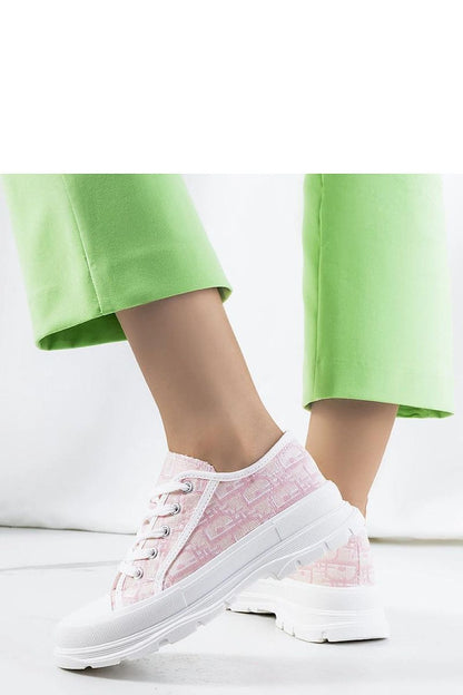Close-up view of Solea's luxury pink platform sneakers Valida, featuring a lightweight rubber sole and fashionable lace-up closure, perfect for summer outings.