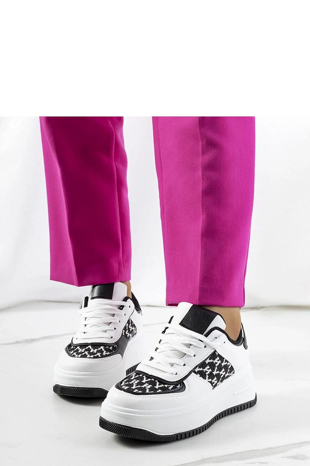 Luxury white Valpara high sole sneakers by Solea, perfect for summer stylishness with a sleek design and comfortable fit.