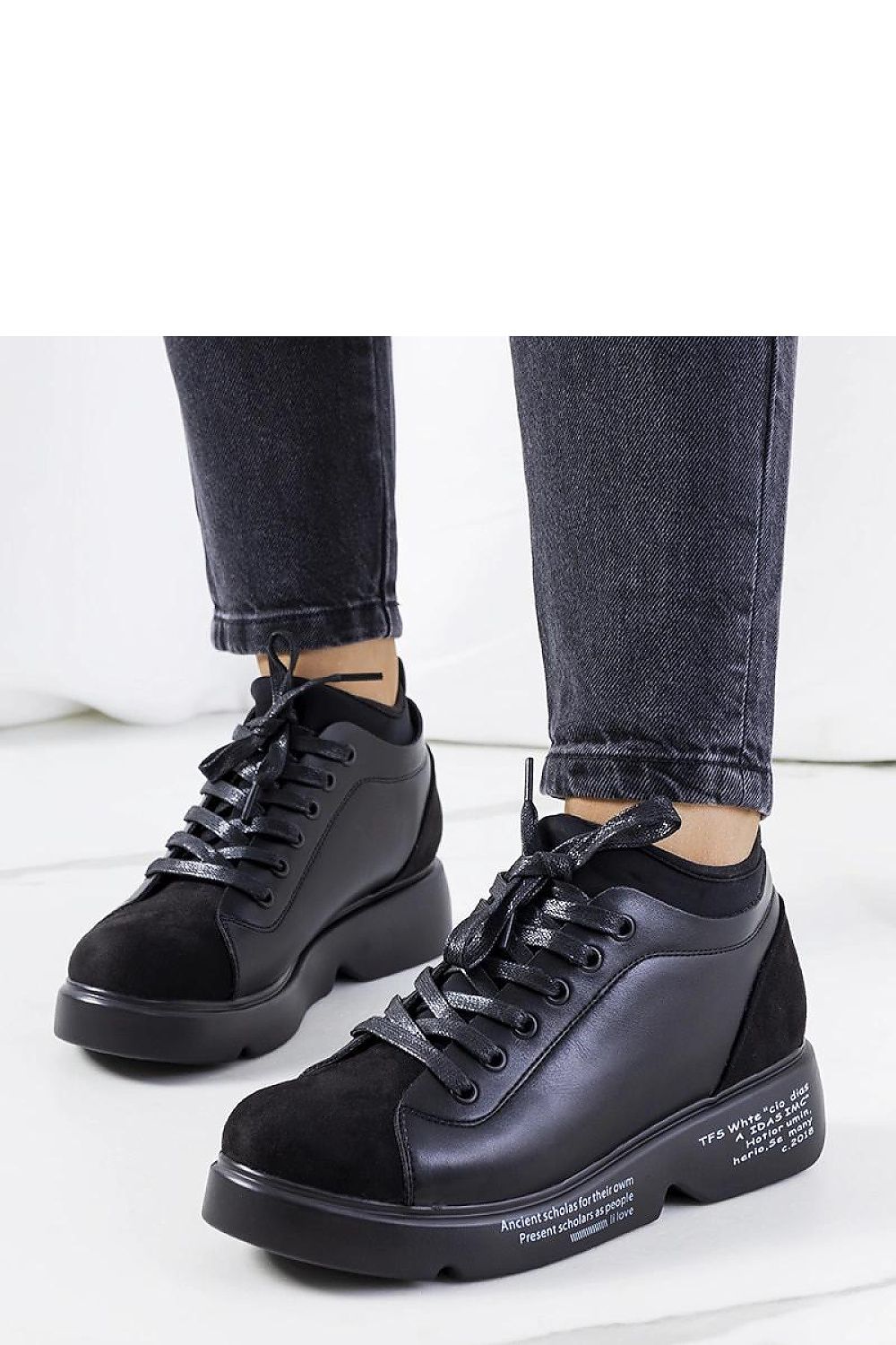 High-quality black high sole sneakers for women by Solea, capturing a chic and elegant summer style.