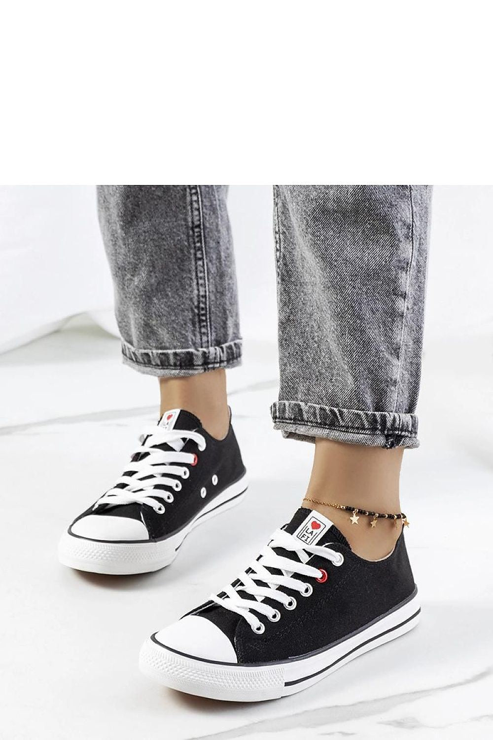 Elegant classic black women's sneakers by Solea, model Kolind, featuring lace-up design and white rubber sole, available in sizes EU 36 to 41, perfect for summer fashion. 