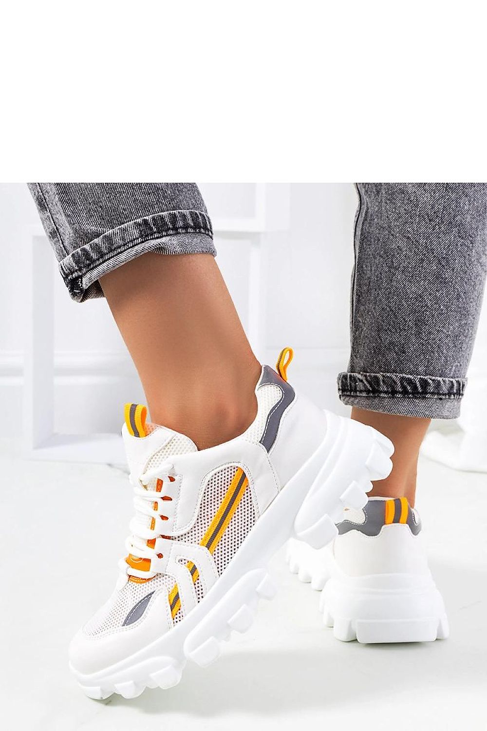 Luxury white women's sneakers Bernier by Solea, featuring a sleek design and reflective accents, suitable for summer stylizations.