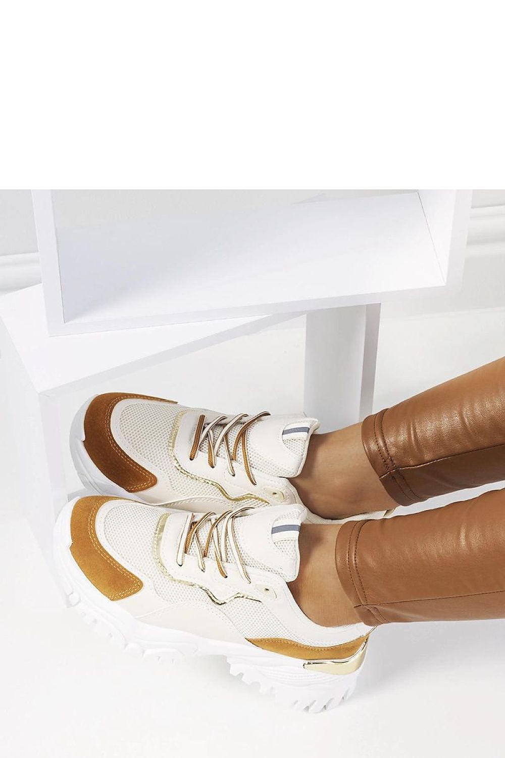 Solea Osorio Beige Sports Shoes with a patterned sole and gold accents, highlighting luxury and comfort for women's summer footwear.