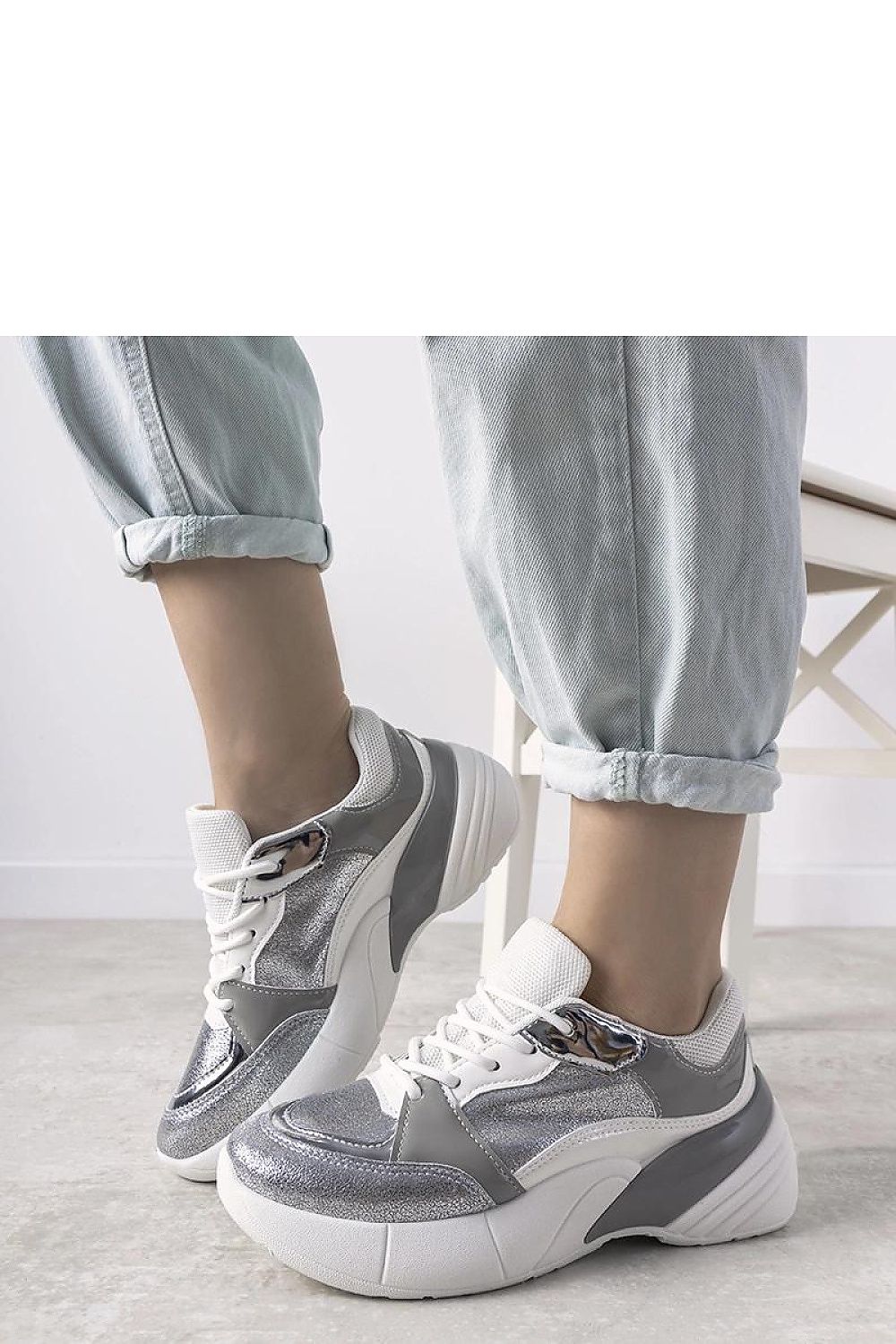 Solea luxury Rude silver high sole sneakers crafted from eco-leather, showcasing a unique metallic cracked leather design, ideal for autumn fashion.