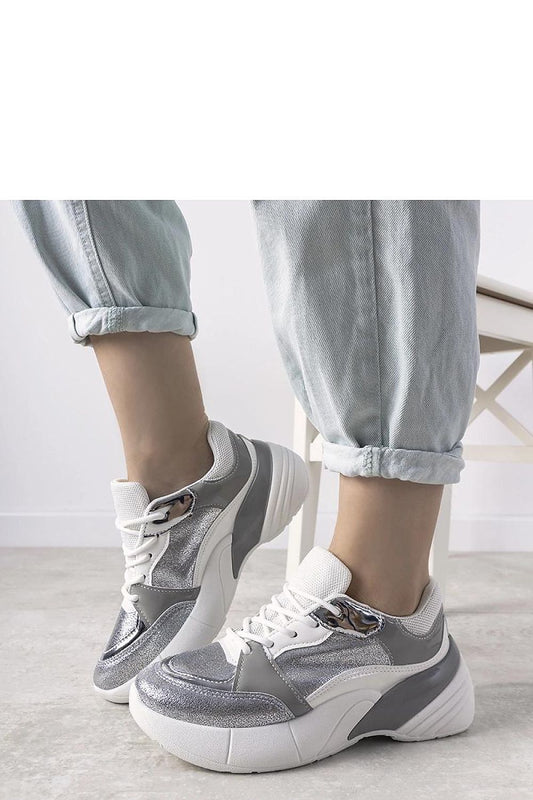 Solea luxury Rude silver high sole sneakers crafted from eco-leather, showcasing a unique metallic cracked leather design, ideal for autumn fashion.