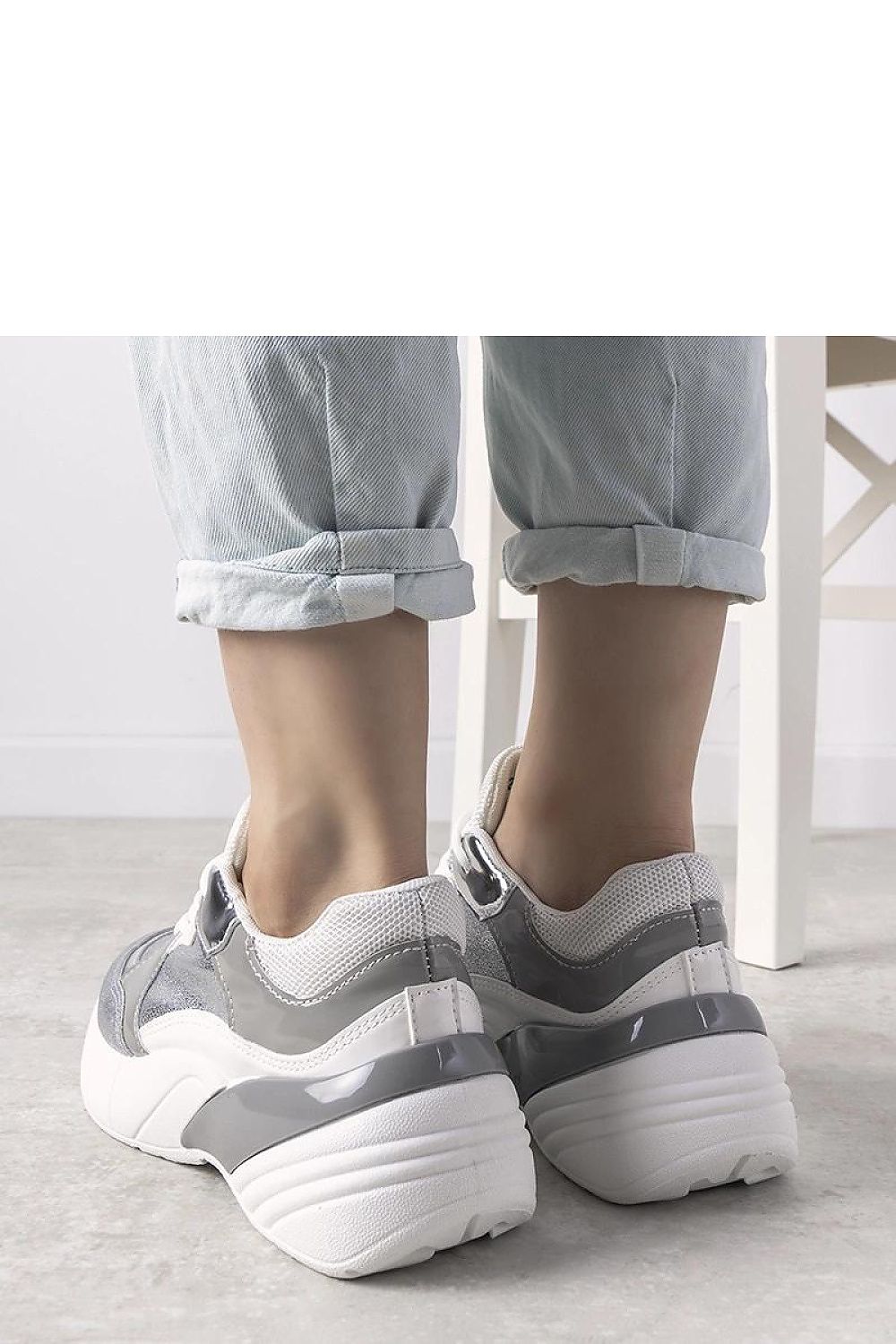 Stylish Solea Rude silver high sole sneakers in eco-leather with patent accents, providing a chic look for autumn and winter wear.