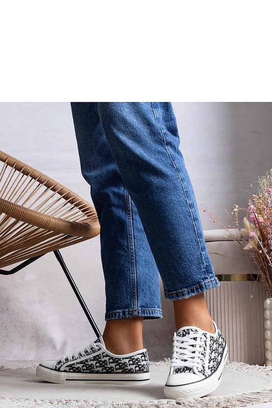 Solea Rimmie women's sneakers in classic black and white, showcasing stylish comfort and high-quality materials for casual elegance.