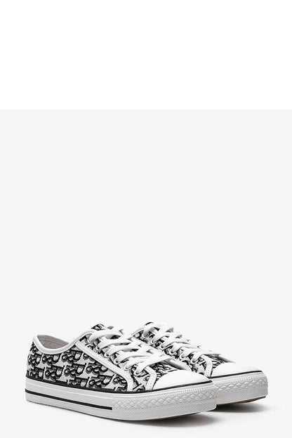 Solea Rimmie women's sneakers displayed against a neutral background, emphasising the flexible white rubber sole and versatile fashion appeal.