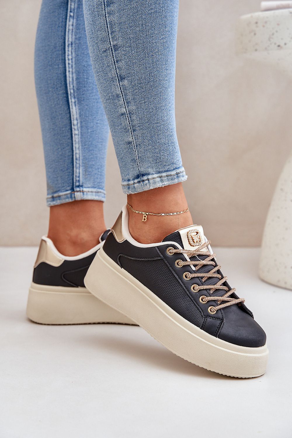 Luxury women's eco leather sport sneakers by Step in Style featuring a trendy platform and shiny lacing detail in EU sizes 36-41.