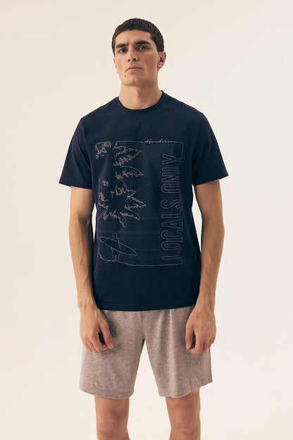 Luxurious Henderson cotton sleepwear set, including a versatile pajama shirt and lightweight shorts for a relaxing night’s sleep.