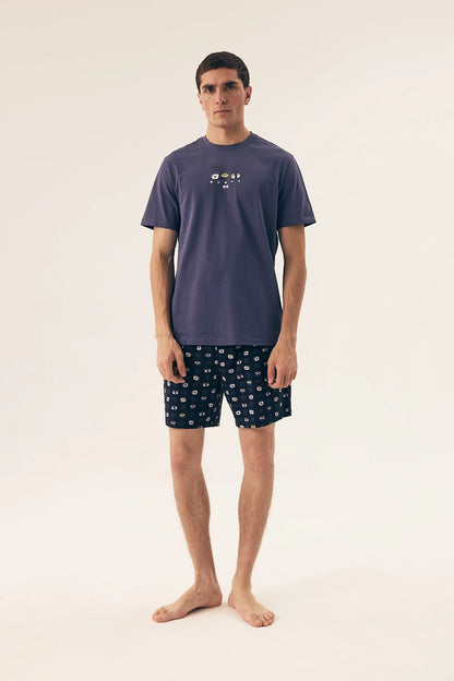 Luxury Henderson Men's Cotton Pyjamas Set showcasing soft and breathable fabric, featuring a classic round neck t-shirt and stylish printed shorts, perfect for comfortable and relaxing sleep.