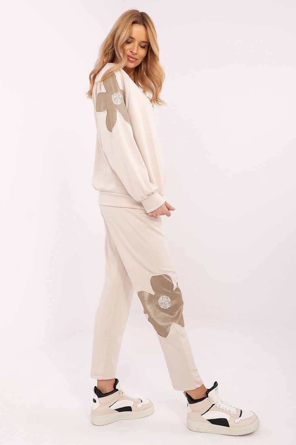 Luxury women's tracksuit set by Italy Moda, featuring a comfortable sweatshirt with zircon flower inserts and stylish high-waisted pants.