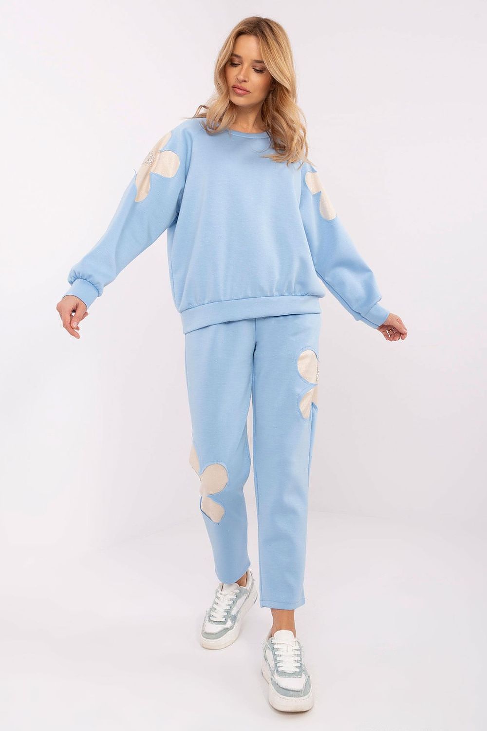 Luxury women's tracksuit set by Italy Moda featuring zircon flower inserts, showcasing a stylish sweatshirt and high-waisted pants for a comfortable fit in EU size 0.
