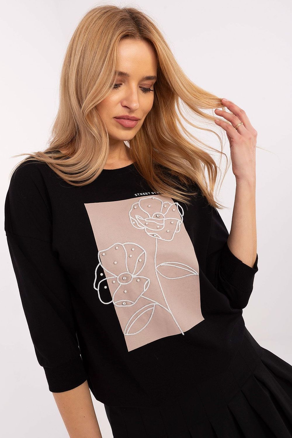 Elegant 3/4 sleeve casual blouse featuring intricate embroidery and decorative pearls, designed by Relevance for a luxurious everyday style.